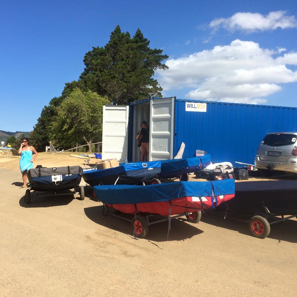 Mirror dinghies in a queue waiting to be packed into a container