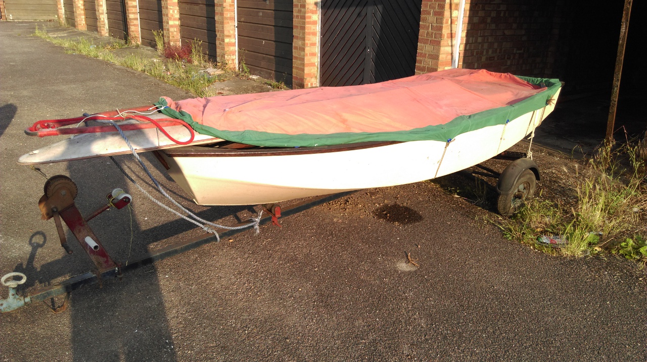 An old Mirror dinghy on a trailer