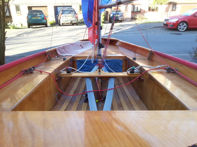 Mirror dinghy interior with shrouds attached to U channel adjusters photographed from the stern 