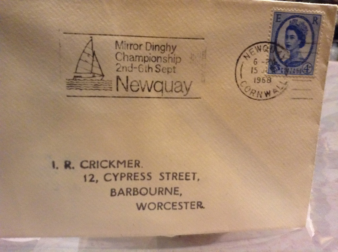 A photo of an envelope with a franking mark over the postage stamp